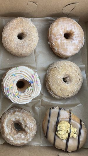 fried dough, glazed brioche, strawberry funfetti, cinnamon sugar, apple cider and pumpkin cookie dough 🍩  #Veganuary at Lovebirds Donuts in Kittery