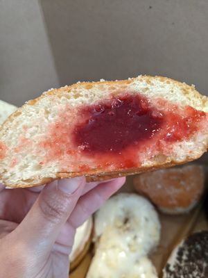 Inside of cherry jam donut at Lovebirds Donuts in Kittery