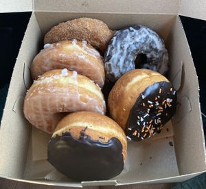cinnamon sugar, chocolate glazed, chocolate ganache, glazed brioche and boston cream!  at Lovebirds Donuts in Kittery