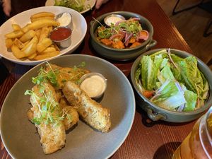 Fries, popcorn tofu, house salad and fried pickles  at The Craft Embassy in Christchurch