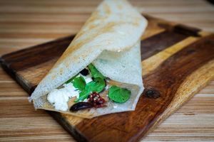 Mediterranean Dosa - Sun dried tomato, Kalamata olives, spinach, goat cheese 
Vegan option : avocado instead of goat cheese at Ganesh Dosa in Kailua