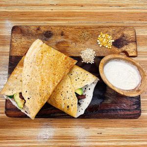 Mediterranean Dosa (Vegan)
- Sun-dried tomato, Spinach, avocado, olive
served with coconut chutney at Ganesh Dosa in Kailua