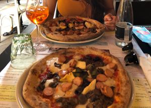 Vegan pizza with vegan cheese and sausage at Rossopomodoro in Venice