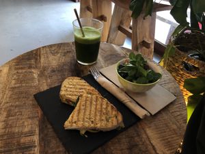 Toast with vegan cheese and rucola and a side salad. at PLANT SHACK - Altea in Altea
