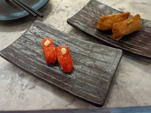 Watermelon nigiri and bacon nigiri at PLANTA Queen in Toronto