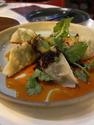 Spinach, shiitake dumplings  at PLANTA Queen in Toronto