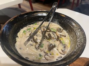 Udon noodles in truffle mushroom cream- so creamy and filling  at PLANTA Queen in Toronto