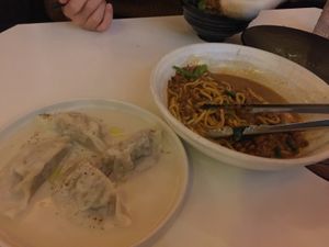 Potato and truffle dumpling (left), Dan Dan noodle(right) at PLANTA Queen in Toronto