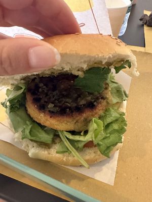 Vegan burger inside - burnt oily potato patty   at Tipiko in Agrigento