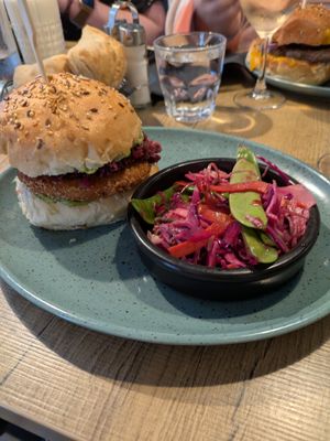 Vegan burger (potato patty topped with a kidney bean and beetroot crush and guacamole). Lightly pickled vegetables/slaw was very good at Daily Gourmand in Vannes