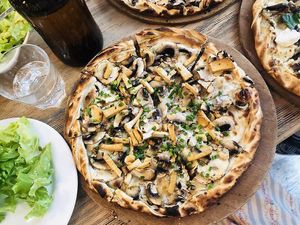 Vegan flamm : mushroom soya cream tofu and ognons  at L'Alsacien in Paris