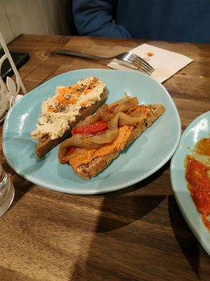 Hummus toast and "romesco" toast. at CReeA in Tarragona