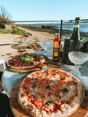 Vegan margherita & vegan roasted red pepper, black olives and rocket pizza 🍕   at Salt Café in Fareham