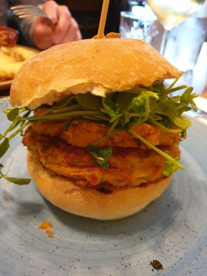 Spiced carrot hash burger with carrot hummus at The Red Lion & Sun in North London