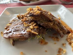 Onion bhagi with sweet chili sauce.  at B12 in Girona