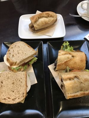Really tasty sandwiches! One with seitan, one with cheese, and a small sausage one   at B12 in Girona