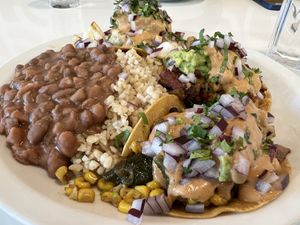 Taco trio with beans and rice   at Slice of Life in Sebastopol