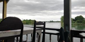Riverfront views at Mama Tanon Cafe in Don Det