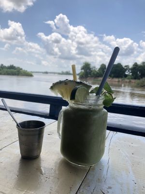 Pineapple smoothie witch coconut and spinach! at Mama Tanon Cafe in Don Det