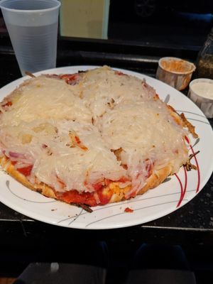 Pizza with onions and ranch dressing at Eden Vegan Cafe in Scranton