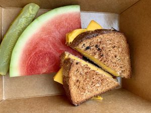 Grilled cheese with side of fruit at Eden Vegan Cafe in Scranton