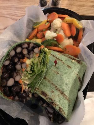 Black bean and avocado wrap with side veggies. HUGE portion, delicious too! at Eden Vegan Cafe in Scranton