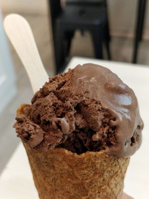 Sea salted Caramel vegan ice cream in a cone at Kind Kones - Forum in Central Singapore