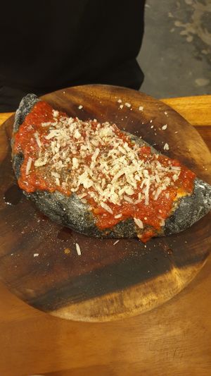 Calzone - 4 Stagioni with charcoal dough!  at Amami Garden in Ungasan