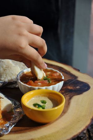 Idli Sambar- freshly steamed rice cakes served with Sambar ( lentil soup) and chutney.  at Spice 6 in Washington