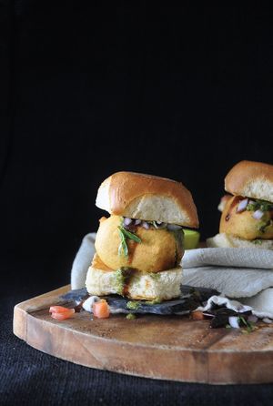 Vada Pav- Indian style burger with a spiced potato fritter in chickpea batter, served between Indian style bun and red garlic powder.  at Spice 6 in Washington