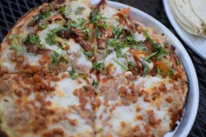 Half mexicana half al pastor at esTACOmo quiere in Puebla