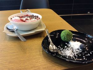 Pink avocado smoothie bowl and ginger-lime ball. at Kilo&Gram in Bergen