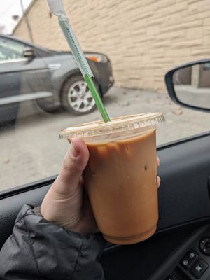 Iced neopolitan latte with almond milk at Happy Bellies Bake Shop in Appleton