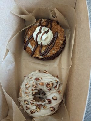 Maple pecan espresso donut (bottom) and s'mores donut (top) at Happy Bellies Bake Shop in Appleton