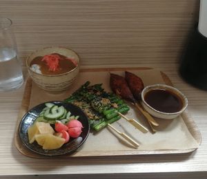 Lunch deal - tofu tsukune, asparagus, Japanese pickles, and rice with katsu sauce! at Kushi-ya in Nottingham