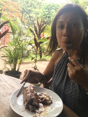 Enjoying French toast  at Roots Cafe in Siem Reap
