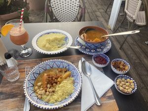 The vegetable couscous comes with a Sauce, raisins, chickpeas and harissa (of you like it spicy)  at Le Souk in Marseille