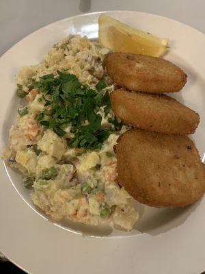 Potato salad with deep fried corn schnitzel meat  at Eaternia in Prague