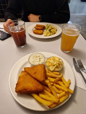 Smažák (fried cheese) with french fries and cornpatty with potato salad. at Eaternia in Prague