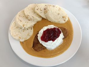 Vegan Svíčková (Traditional Czech Gravy Stew with Cranberries and Cream) at Eaternia in Prague