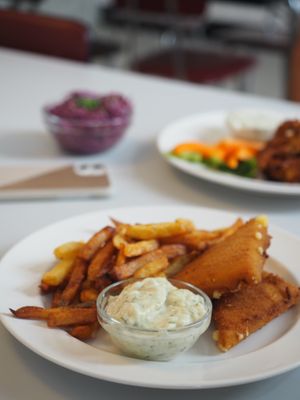 Fried cheese with fries and sour cream at Eaternia in Prague