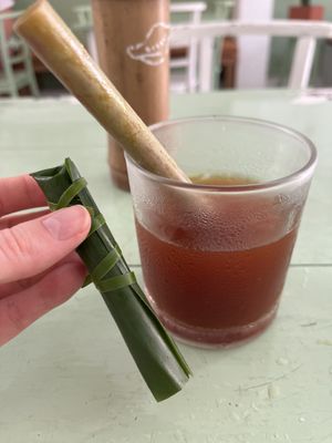 iced americano at a very lovely place! appreciated the banana leaf packaging on everything  at Dumplings Cafe in Galle