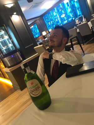 Friendly waiter and complimentary aperitif  at Capri in Calpe
