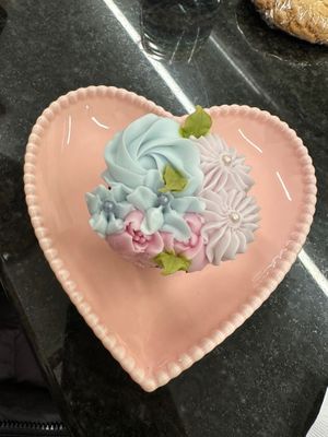 Cutest plates, amazing cupcake flavors and such talent on the frosting! Alway a artistic masterpiece! at The Littlest Bake Shop in Kansas City