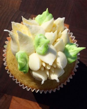 Pistachio cupcakes filled with raspberry compote and lemon frosting  at The Littlest Bake Shop in Kansas City