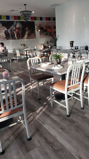 Indoor seating with view of marina at Himalayan Grill in Huntington Beach
