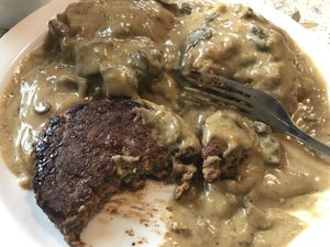 Vegan scratch-made biscuits and gravy with housemade vegan sausage patty. Comfort food to the max! at The Red Bird Cafe in Roslyn