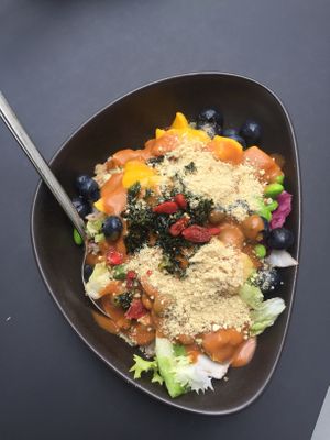 my favorite kind of bowl with quinoa and salad, blueberries, mango... at Yuícery - Hospitalstraße in Stuttgart