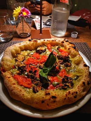 Pizza vegana, it was tasty, a little bit more expensive than the other pizzas. at A'nica in Palermo