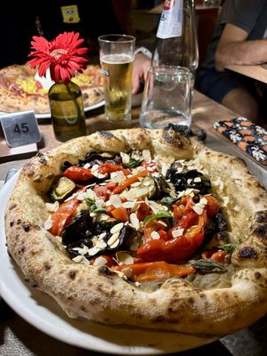 Pizza Vegana - crème d’aubergine, légumes grillés (aubergine, courgette, poivron), tomates cerises, menthe et amendes émondées.   at A'nica in Palermo
